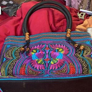 Purple embroidered purse